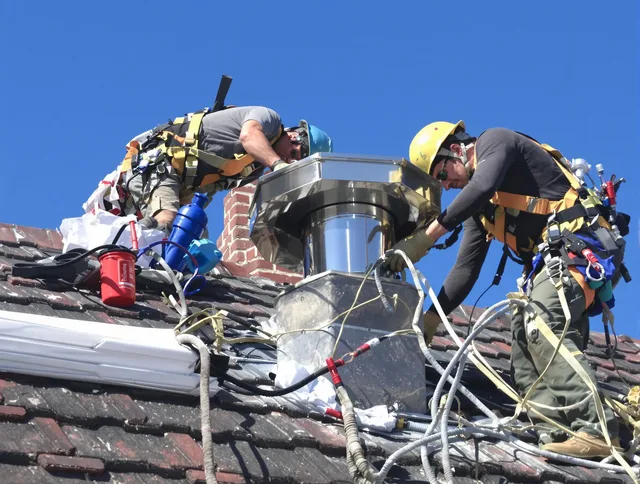 Protective chimney cap installed by Sudbury Chimney Sweep in Sudbury, MA