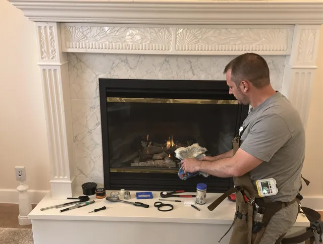 Sudbury Chimney Sweep performing fireplace maintenance in Sudbury, MA