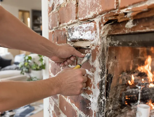 Routine fireplace repair by Sudbury Chimney Sweep in Sudbury, MA